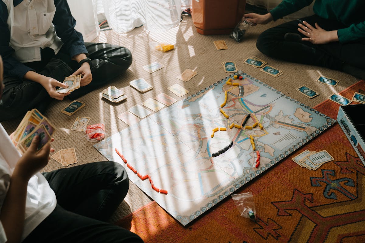 Couple playing board games together at home